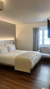 Postel nebo postele na pokoji v ubytování Livô Boutique Living