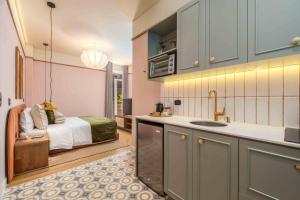 卡利Veca Flats Centenario的一个带床和水槽的厨房 更多40张照片