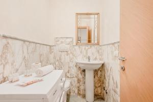 Ένα μπάνιο στο Incantevole appartamento fronte mare