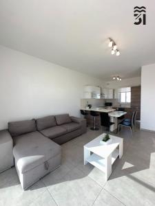 Χώρος καθιστικού στο M31Stays - St Paul's Modern Apartments and Penthouse +13 φωτογραφίες