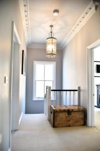 En eller flere senge i et værelse på White Fox House