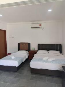 Ένα ή περισσότερα κρεβάτια σε δωμάτιο στο Aimers Lodge +23 φωτογραφίες