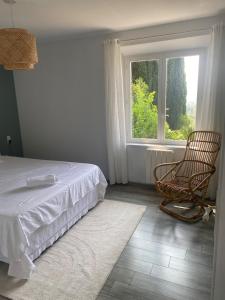 Postel nebo postele na pokoji v ubytování Villa Bella Vista vue panoramique imprenable + 28 fotografií