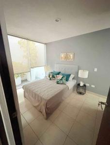 Ένα ή περισσότερα κρεβάτια σε δωμάτιο στο Casa Castelo