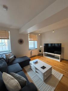 Μια τηλεόραση ή/και κέντρο ψυχαγωγίας στο Le Cocon Central avec Balnéo