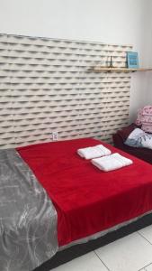 Ένα ή περισσότερα κρεβάτια σε δωμάτιο στο Casa com garagem 4 pessoas +12 φωτογραφίες