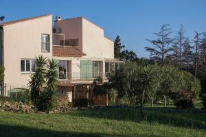a villa with a view of the house at Mas Élunia, Gites et Chambres d'hôtes, entre Mer et Montagne in Argelès-sur-Mer