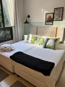 Ένα ή περισσότερα κρεβάτια σε δωμάτιο στο Real Residence Hotel