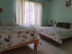 Postel nebo postele na pokoji v ubytování Casa Beli