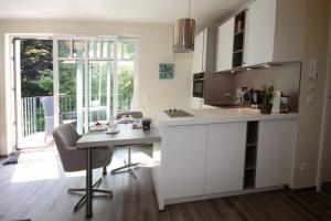 Kuchyň nebo kuchyňský kout v ubytování Linden Palais We 22