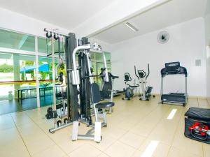 a gym with treadmills and cardio equipment in a building at Resort Internacional DiRoma in Caldas Novas