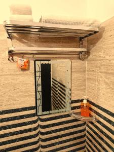 a window on the side of a building at Hotel Classic Inn in Jāmb