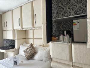 Kuchyň nebo kuchyňský kout v ubytování Kiwara Guesthouse