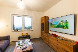 Billede fra billedgalleriet på Luxus-Ferienhaus mit Sauna, Hot Tub und grandiosem Panorama i Winterberg + 23 billeder