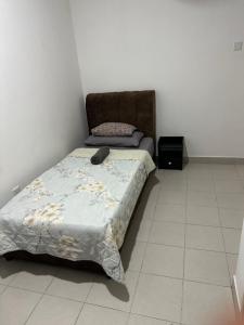 Ένα ή περισσότερα κρεβάτια σε δωμάτιο στο PakyaZ Homestay +2 φωτογραφίες