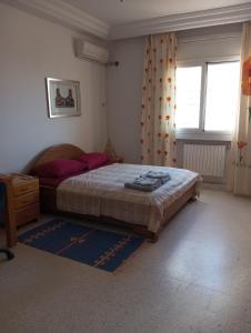 Ένα ή περισσότερα κρεβάτια σε δωμάτιο στο Room Flower Near Airport
