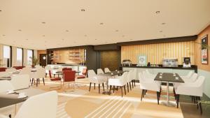 Una representación de un restaurante con mesas y sillas. en Le Colisée Nantes St Herblain devient Ibis Styles à partir du 2 décembre 2025, en Saint-Herblain
