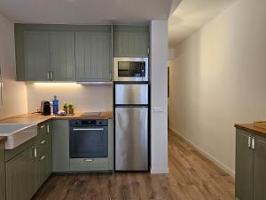 Η κουζίνα ή μικρή κουζίνα στο Adumar, apartamento renovado en el puerto de Jávea