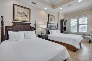 Ένα ή περισσότερα κρεβάτια σε δωμάτιο στο Sea Gate #108 +18 φωτογραφίες