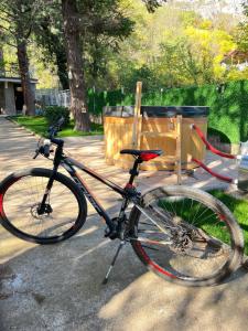 a bike parked on the side of a street at Viva Sićevo in Železnička Stanica Sićevo