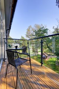 Ban công/sân hiên tại Poddąbek Comfort I Apartamenty z tarasem na dachu, ogródkiem, basenem zewnętrznym i wewnętrznym, salą zabaw i animacjami