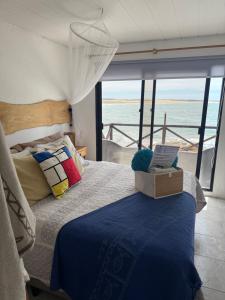 Postel nebo postele na pokoji v ubytování Posada Mariemar Cabo Polonio