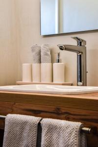 Příslušenství pro přípravu čaje a kávy v ubytování Sonnenhotel Soldanella Sonneck + 44 fotografií