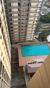 an overhead view of a swimming pool in a building at Oval View Residence by C in Colombo