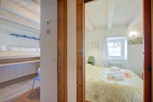 Ένα ή περισσότερα κρεβάτια σε δωμάτιο στο Antico Chalet Livigno +48 φωτογραφίες