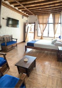 Μια τηλεόραση ή/και κέντρο ψυχαγωγίας στο El Viejo y El Mar Hostal Restaurante