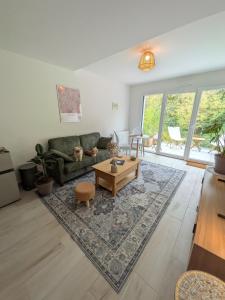 O zonă de relaxare la Appartement calme et lumineux au cœur de Carteret