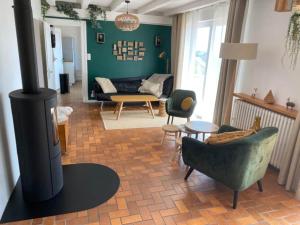 Posezení v ubytování A l'Oree du Bois