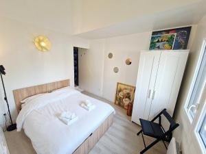 Voodi või voodid majutusasutuse Appartement Business Lyon nord Gare & A6 toas +13 fotot