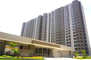 a large apartment building with a lot of windows at Mirador Apartments – Excellent Location by SOHO in Barranquilla