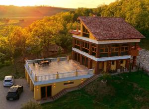 an aerial view of a house with a large deck at VILLA BEELVITA - PRIVATE POOL& JACUZZi in Bielovce