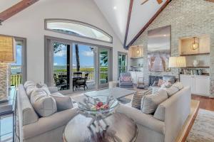 a living room with couches and a table at MG3083: 3083 Marshgate in Seabrook Island