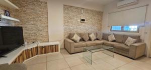 Posezení v ubytování Finikoudes gate