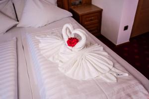 Postel nebo postele na pokoji v ubytování Hotel Tannhof