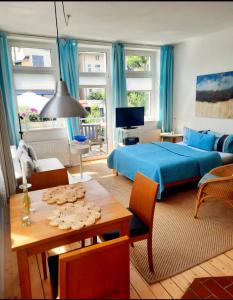 TV a/nebo společenská místnost v ubytování Haus Alexandrine