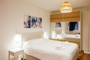 Postel nebo postele na pokoji v ubytování BGY Maison del Borgo 2 + 23 fotografií