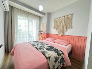 Postel nebo postele na pokoji v ubytování merkezde 2 odalı minimalist ev