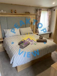 Ένα ή περισσότερα κρεβάτια σε δωμάτιο στο Peaktop View, Winscales, Cumbria