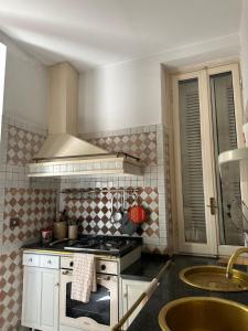 Η κουζίνα ή μικρή κουζίνα στο Villa Margherita