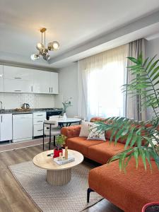 Kuchyň nebo kuchyňský kout v ubytování merkezde 2 odalı minimalist ev