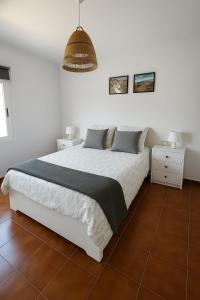 Postel nebo postele na pokoji v ubytování Villamaría, Alma de Despeñaperros