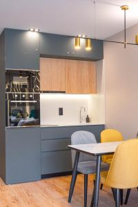 Η κουζίνα ή μικρή κουζίνα στο New Gudauri Atrium Apartments