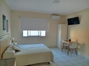 Postel nebo postele na pokoji v ubytování Amanecer Correntino