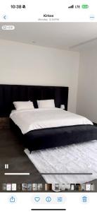 Postel nebo postele na pokoji v ubytování Astonishing 3 Bedroom Apartment