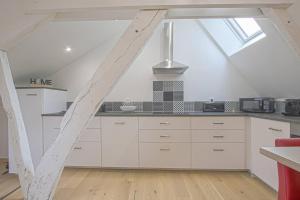 Η κουζίνα ή μικρή κουζίνα στο Duplex centre historique de Bayeux