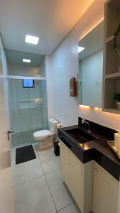 Ένα μπάνιο στο Apartamento Modernizado +28 φωτογραφίες